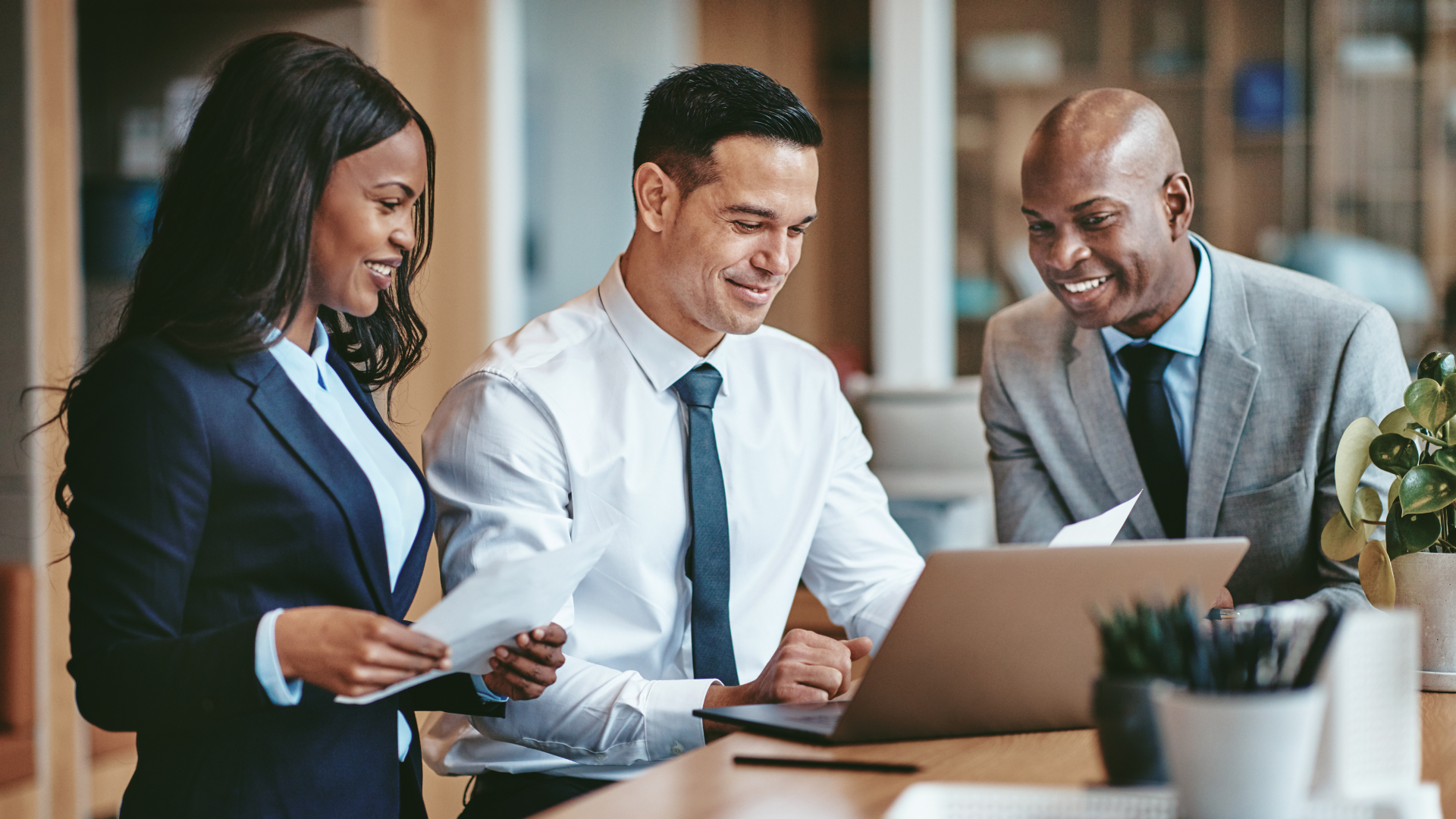 A diverse group of potential business buyers, symbolizing the range Meritus Group caters to.