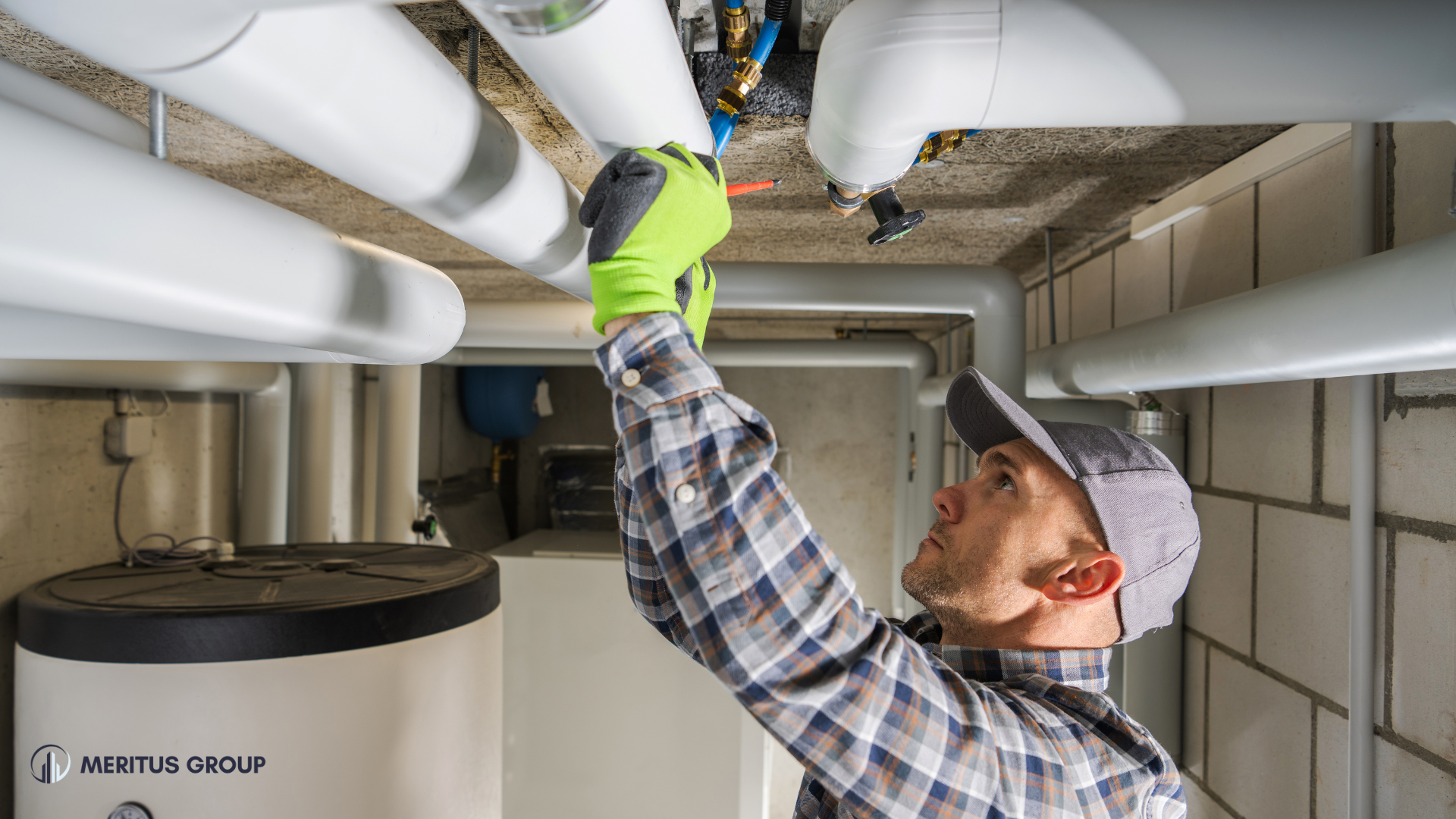 A businessman shaking hands with a buyer in an HVAC showroom