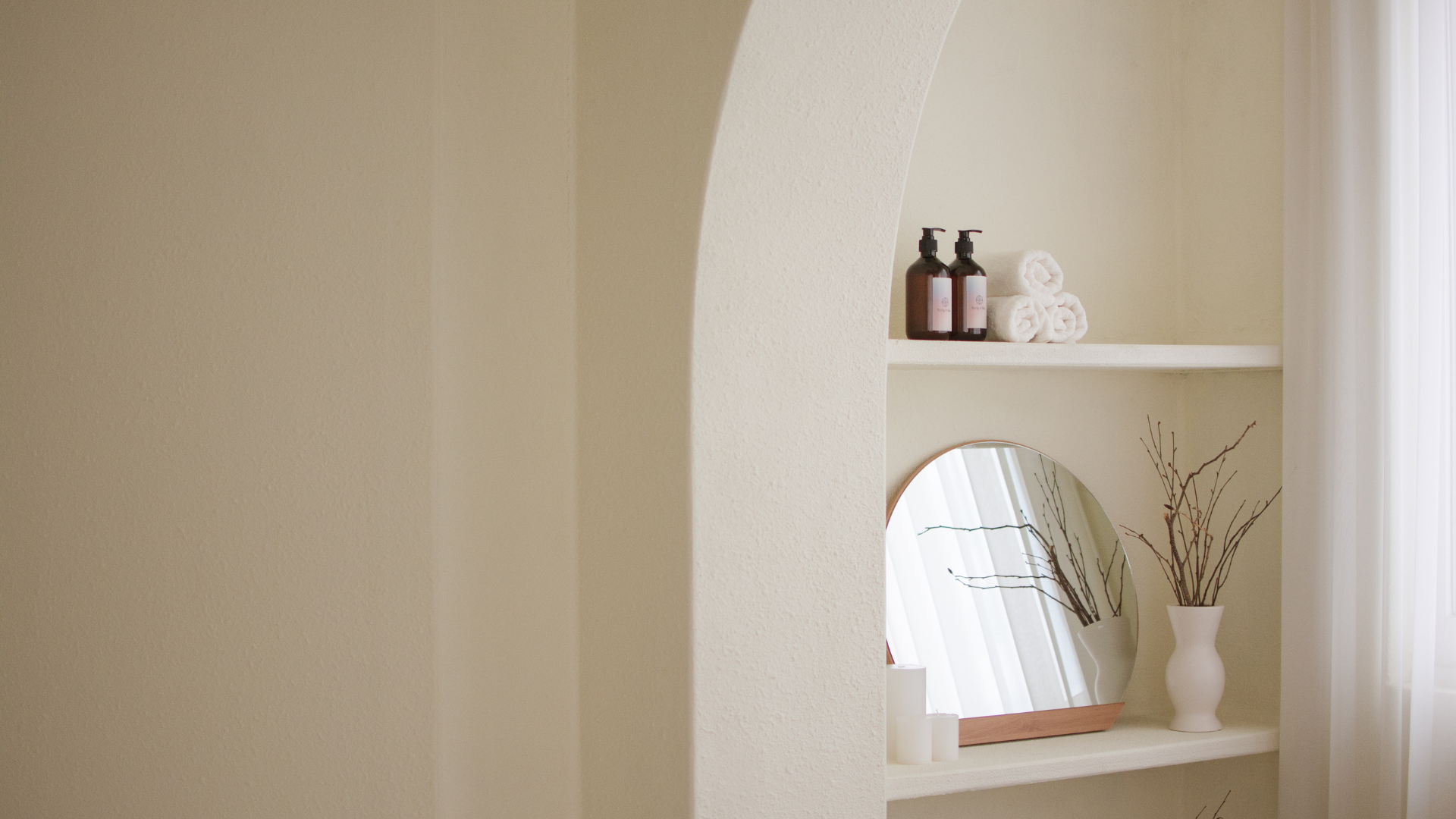 A serene, modern med spa treatment room with soft lighting