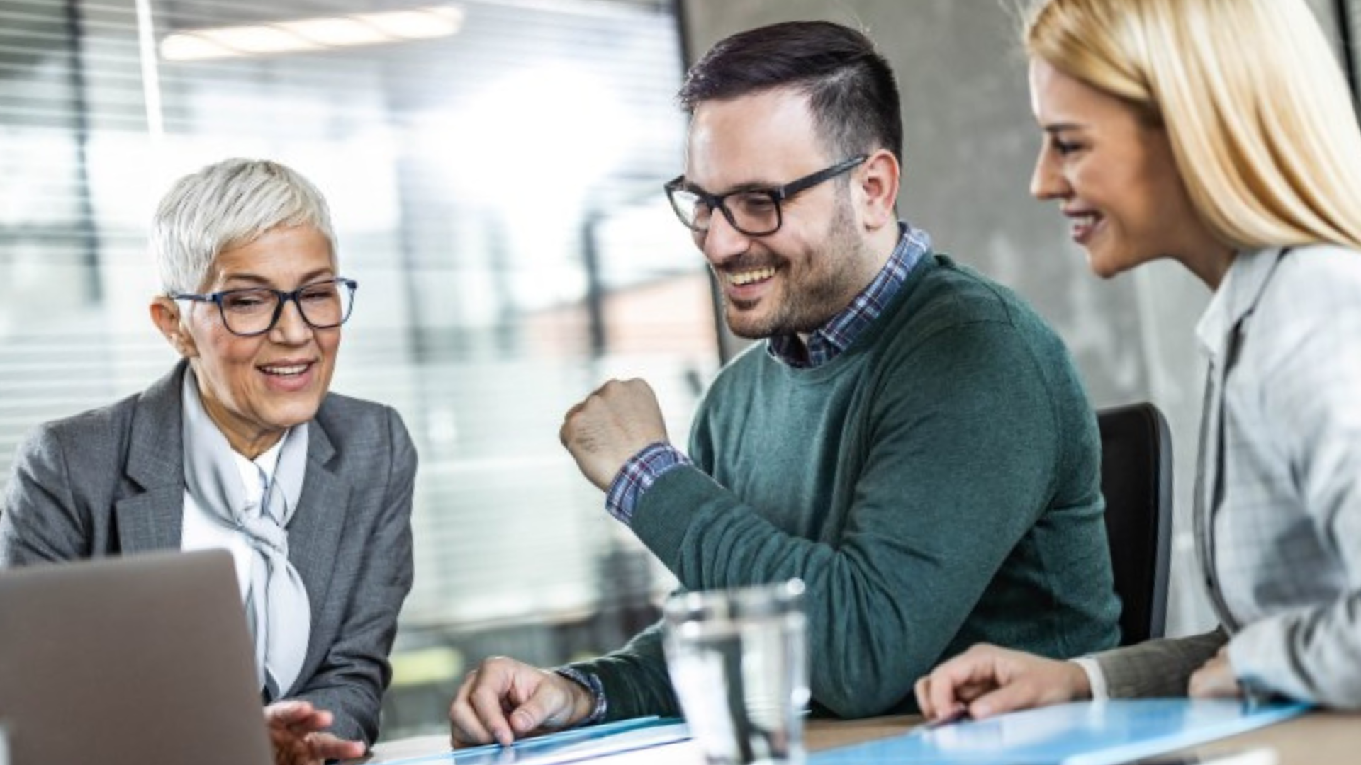 Business owner delegating to team to prepare for sale
