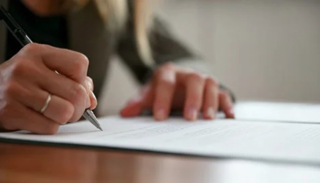 Business owner comparing asset sale and stock sale options with M&A advisor