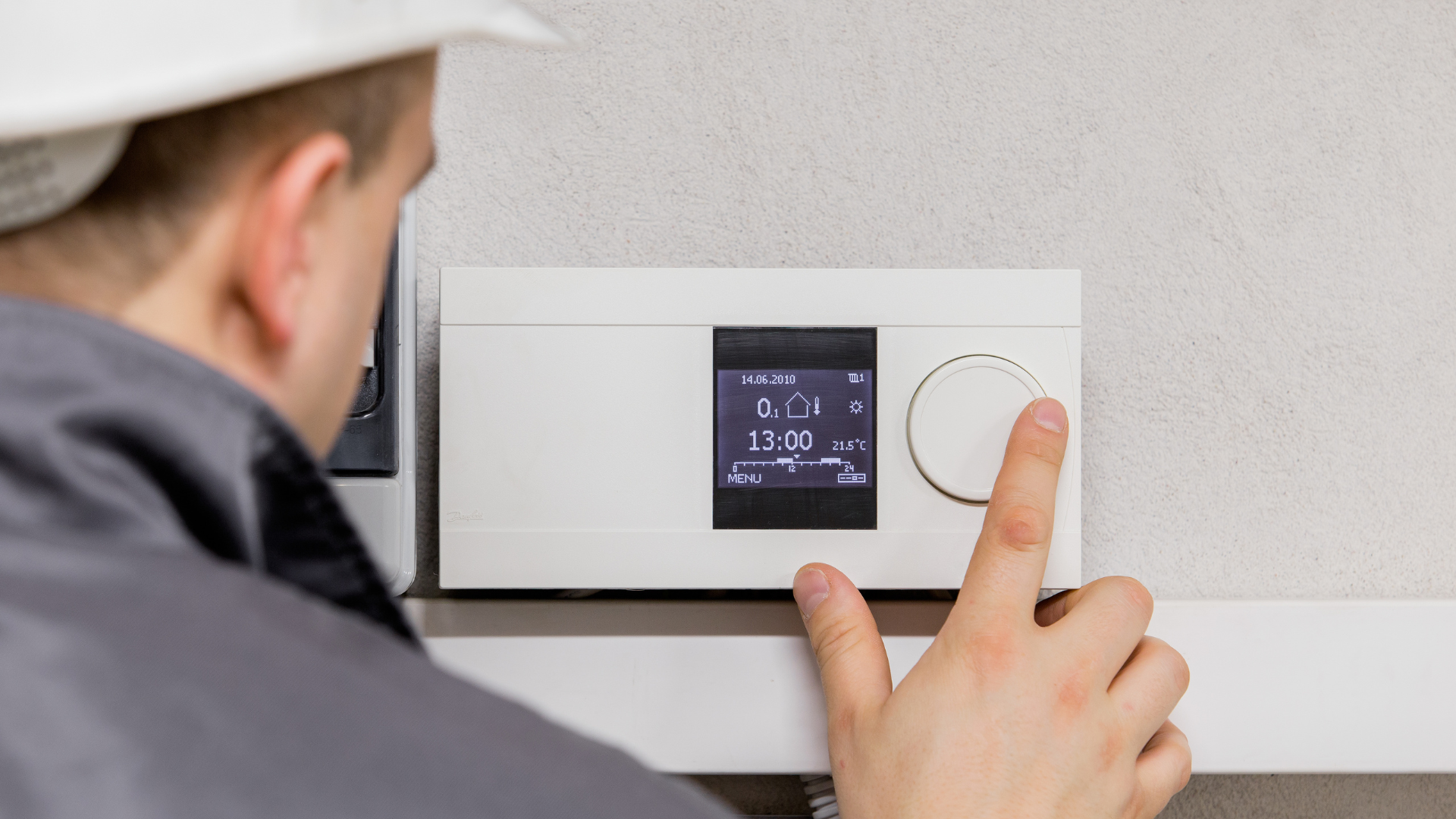 HVAC service technician representing the hot M&A market for home services companies